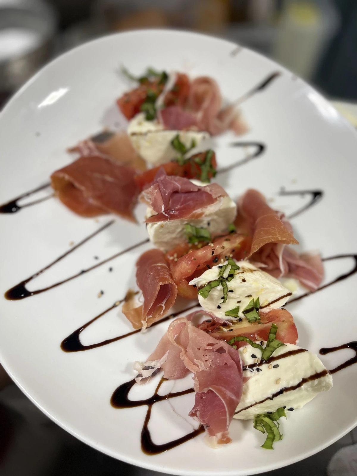 Ensalada Caprese con mozzarella di bufala